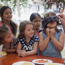 Photo of a group of young girls doing a taste game in Moerwijk, Den Haag