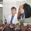 A portrait of a butcher at the market in Belgrade
