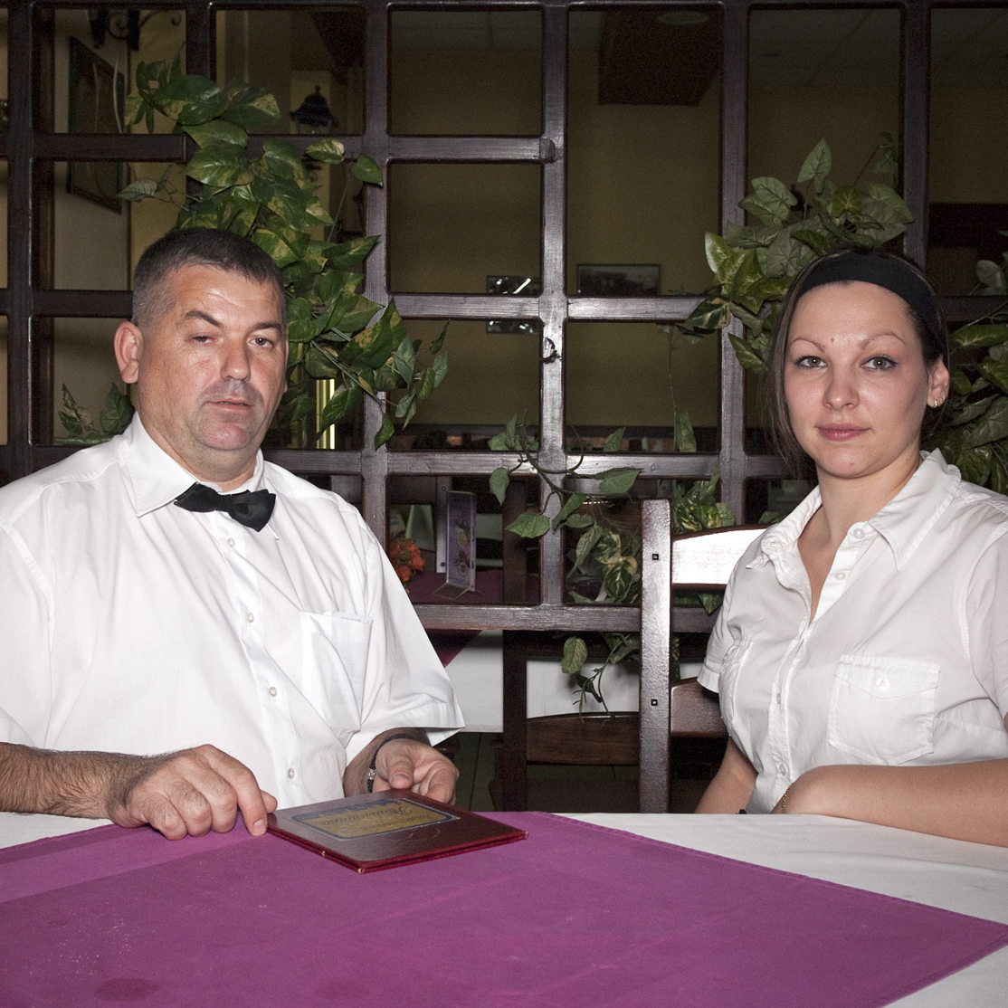 A portrait of a waiter and waitress in restaurant Romantika in Belgrade